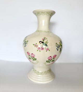 Crackle-Glazed Ceramic Vase With a Raised Floral and Bird Motif